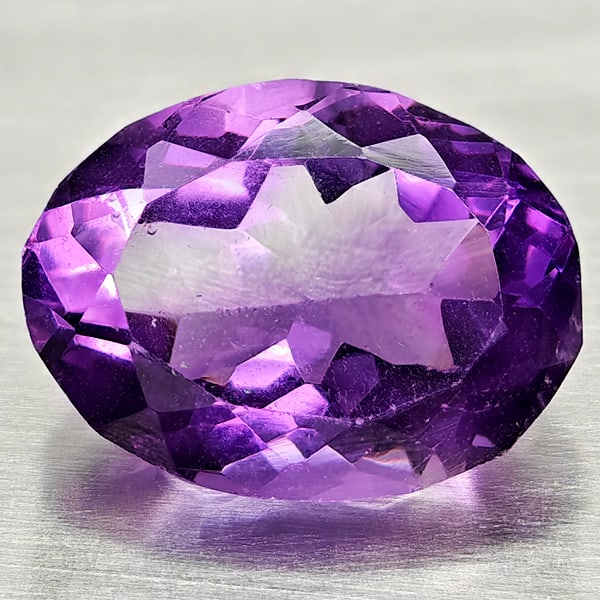 Natural Purple Amethyst Gemstones 5.07 Ct. Oval Shape 12.2 x 9.2 Mm.: Product ID: 800325404 Product Name: Natural Amethyst Weight: 5.07 CT. Size: 12.2 x 9.2 x 7.3 MM. Shape: Oval Color: Purple Clarity:VVS - VSI Luster: Good Gems Origin: Brazil Treatment: Unheated Crysta