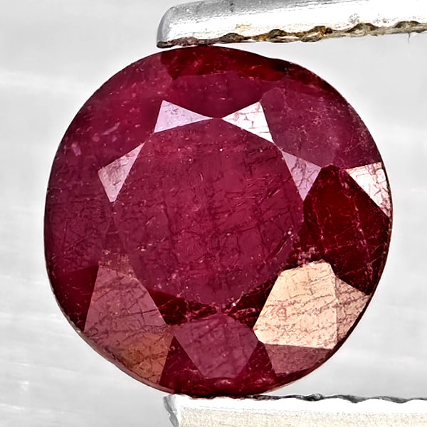 Natural Pinkish Red Ruby 2.13 Ct. Round Shape 7 Mm Gemstone From Madagascar: Product ID: 805935849 Product Name: Natural Ruby Weight: 2.13 CT. Size: 7 x 7 x 5.4 MM. Shape: Round Color: Pinkish Red Clarity:SI1 Luster: Good Gems Origin: Madagascar Treatment: Heated (Lead-glass f