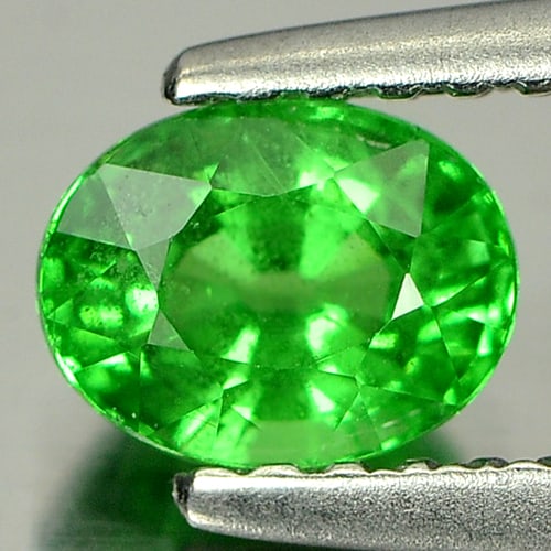 Natural Green Tsavorite Garnet Gemstone 0.79 Ct. Oval Shape 5.9 x 4.6 Mm.: Product ID: 803000676 Product Name: Natural Tsavorite Weight: 0.79 CT. Size: 5.9 x 4.6 x 3.8 MM. Shape: Oval Color: Green Clarity:SI1 Luster: Very Good Gems Origin: Tanzania Treatment: Unheated Crysta
