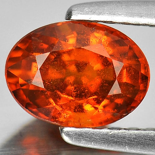Natural Orange Spessartine Garnet Gemstones 1.14 Ct. Oval Shape 7 x 5.2 Mm.: Product ID: 802921400 Product Name: Natural Spessartine Weight: 1.14 CT. Size: 7 x 5.2 x 4.2 MM. Shape: Oval Color: Reddish Orange Clarity:SI Luster: Good Gems Origin: Nigeria Treatment: Unheated Crys