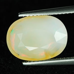 Natural Multi Color Opal Gemstones 3.82 Ct. Oval Shape 13.7 x 10.2 Mm. (1 of 3)