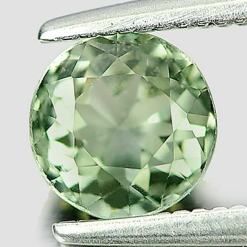 Natural Green Tourmaline Gemstones 0.91 Ct. Round Shape 6 Mm.: Product ID: 807246247 Product Name: Natural Tourmaline Weight: 0.91 CT. Size: 6 x 6 x 4 MM. Shape: Round Color: Green Clarity:VSI Luster: Good Gems Origin: Nigeria Treatment: Unheated Crystal Structur