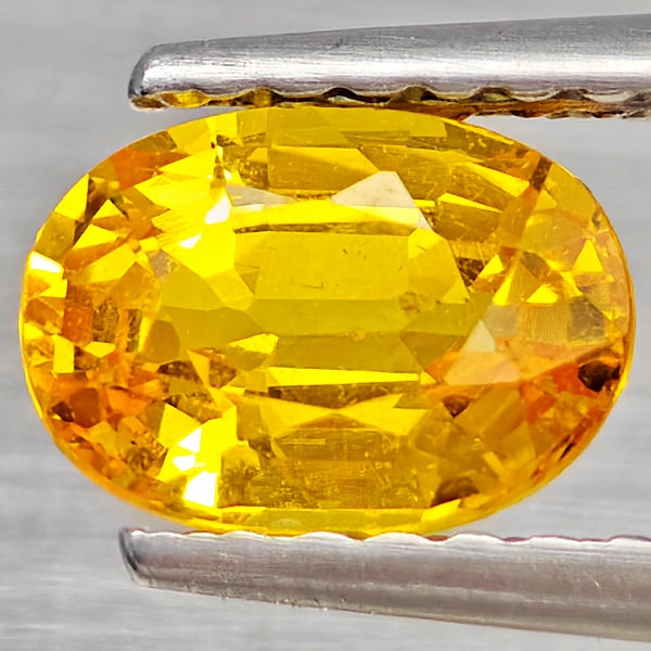 Natural Yellow Sapphire Gemstones 0.92 Ct. Oval Shape 6.9 x 5 Mm.: Product ID: 806162674 Product Name: Natural Yellow Sapphire Weight: 0.92 CT. Size: 6.9 x 5 x 3.5 MM. Shape: Oval Color: Yellow Clarity:VSI Luster: Good Gems Origin: Thailand Treatment: Heated Crystal 