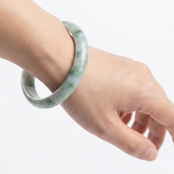Natural Green Jade Gemstones 382.34 Ct. Bangle Round Cabochon Shape 74 x 59 Mm.: Product ID: 819813535 Product Name: Natural Jade Weight: 382.34 CT. Size: 74 x 59 x 17 MM. Shape: Round Color: Green Clarity:Opaque Luster: Good Gems Origin: Thailand Treatment: Unheated Crystal Struc
