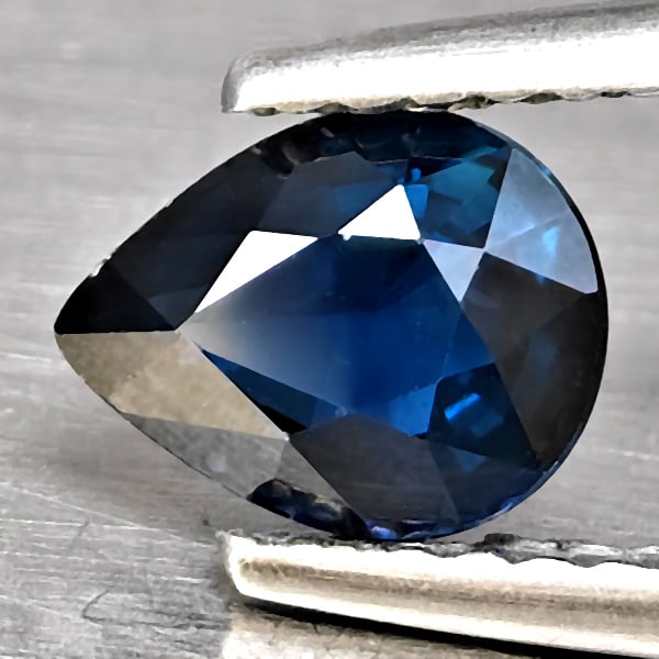 Natural Blue Sapphire Gemstones 0.94 Ct. Pear Shape 6.8 x 5.3 Mm.: Product ID: 806130545 Product Name: Natural Blue Sapphire Weight: 0.94 CT. Size: 6.8 x 5.3 x 3.2 MM. Shape: Pear Shape Color: Blue Clarity:VVS Luster: Good Gems Origin: Madagascar Treatment: Normal He