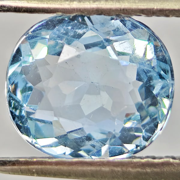 Natural Light Blue Aquamarine Gemstones 1.37 Ct. Oval Shape 7.5 x 6.6 Mm.: Product ID: 800812356 Product Name: Natural Aquamarine Weight: 1.37 CT. Size: 7.5 x 6.6 x 4.4 MM. Shape: Oval Color: Light Blue Clarity:VSI - SI1 Luster: Good Gems Origin: Brazil Treatment: Unheated C