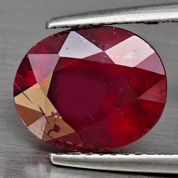Natural Red Ruby Gemstones 4.82 Ct. Oval Shape 10.9 x 8.8 Mm.: Product ID: 805936001 Product Name: Natural Ruby Weight: 4.82 CT. Size: 10.9 x 8.8 x 5.8 MM. Shape: Oval Color: Red Clarity:VSI - SI1 Luster: Good Gems Origin: Madagascar Treatment: Heated (Lead-glass