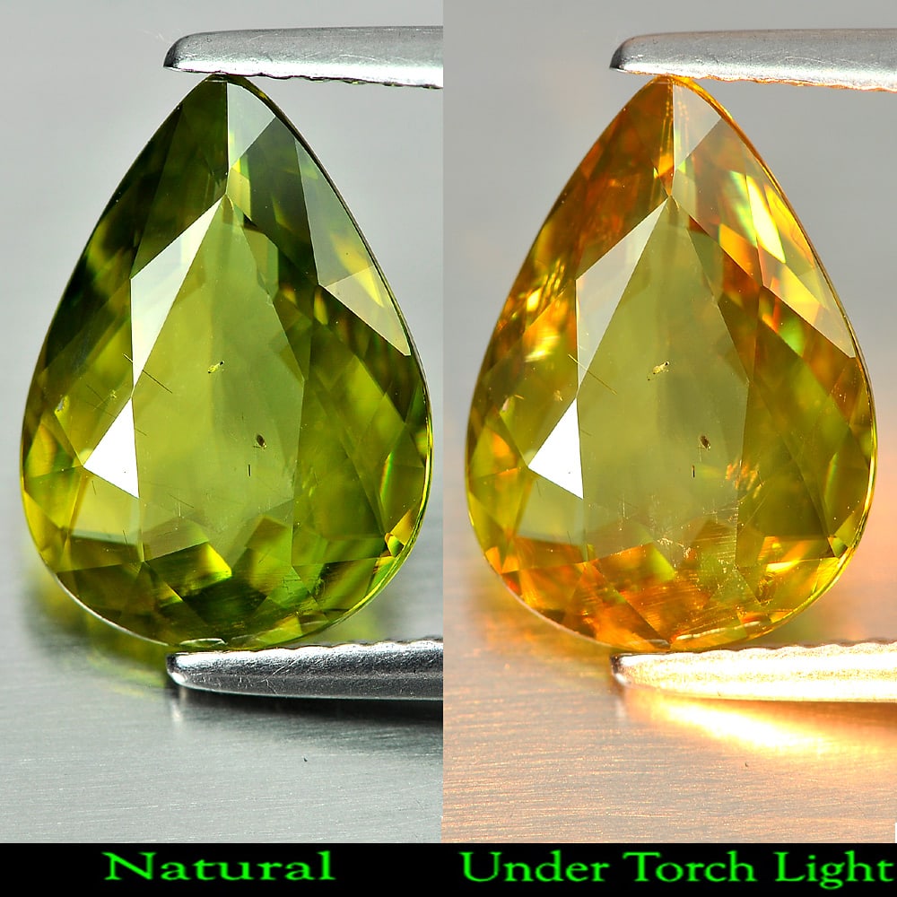 Natural Multi-Color Sphene Gemstones With Rainbow Spark 3.46 Ct. Pear Shape 13.2 x 9.4 Mm.: Product ID: 806508008 Product Name: Natural Sphene Weight: 3.46 CT. Size: 13.2 x 9.4 x 4 MM. Shape: Pear Color: Multi-Color With Rainbow Spark Clarity:VSI Luster: Adamantine Gems Origin: Madagascar Tr