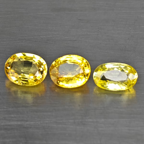 Natural Yellow Songea Sapphire Gemstones 1.09 Ct. 3 Pcs. Oval Shape and Mixed: Product ID: 806130594 Product Name: Natural Yellow Sapphire Weight: 1.09 CT. Size: 5.2 x 3.2 x 2.2 to 5 x 4 x 2.1 MM. Shape: Oval Shape Color: Red Orange Clarity:VVS Luster: Good Gems Origin: Tanzania
