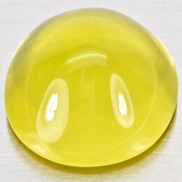 Natural Yellow Lemon Quartz Gemstones 16.53 Ct. Oval Cabochon Shape 17.3 x 16 Mm.: Product ID: 805530006 Product Name: Natural Quartz Weight: 16.53 CT. Size: 17.3 x 16 x 9.6 MM. Shape: Oval Cabochon Color: Yellow Lemon Clarity:Semi - Transparent Luster: Good Gems Origin: Brazil Trea