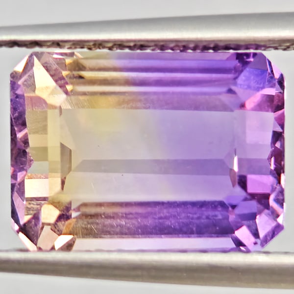 Natural Bi Color Ametrine Gemstones 2.84 Ct. Octagon Shape 11.4 x 8.4 Mm.: Product ID: 800408576 Product Name: Natural Ametrine Weight: 2.84 CT. Size: 11.4 x 8.4 x 6.8 MM. Shape: Octagon Color: Bi Color Clarity:VSI Luster: Good Gems Origin: Bolivia Treatment: Unheated Crysta