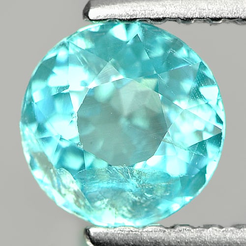 Natural Paraiba Color Apatite Gemstones 0.86 Ct. Round Shape 5.9 Mm.: Product ID: 800609729 Product Name: Natural Apatite Weight: 0.86 CT. Size: 5.9 x 5.9 x 3.7 MM. Shape: Round Color: Neon Blue Clarity:VSI Luster: Good Gems Origin: Tanzania Treatment: Unheated Crystal 