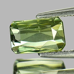 Natural Green Tourmaline Gemstone 1.36 Ct. Octagon Shape 7.3 x 4.6 Mm.: Product ID: 807237540 Product Name: Natural Tourmaline Weight: 1.36 CT. Size: 7.3 x 4.6 x 4 MM. Shape: Octagon Color: Green Clarity:VSI Luster: Good Gems Origin: Nigeria Treatment: Unheated Crystal St
