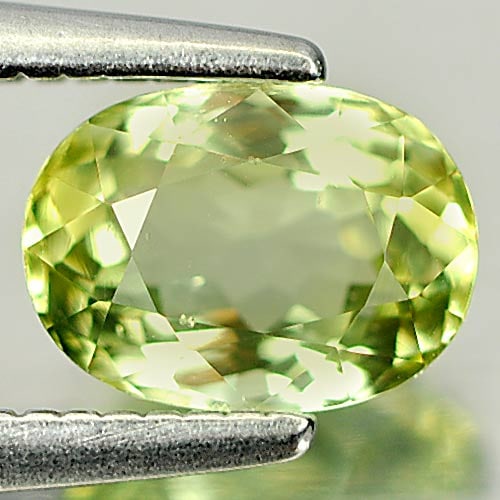 Natural Light Yellowish Green Tourmaline Gemstones 0.86 Ct. Oval Shape 6.7 x 4.9 Mm.: Product ID: 807246002 Product Name: Natural Tourmaline Weight: 0.86 CT. Size: 6.7 x 4.9 x 3.7 MM. Shape: Oval Color: Light Yellowish Green Clarity:VSI Luster: Good Gems Origin: Nigeria Treatment: Unhe