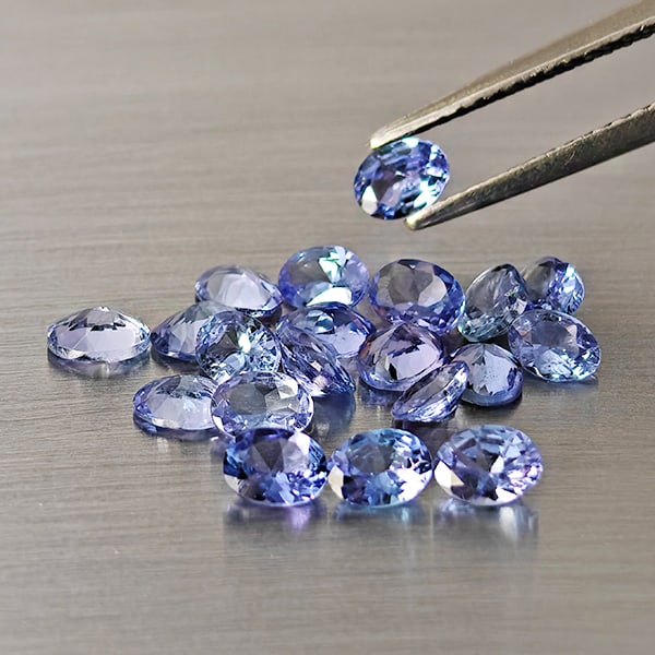 Natural Violetish Blue Tanzanite Gemstones 3.57 Ct. 20 Pcs. Oval Shape and Mixed Size: Product ID: 807015133 Product Name: Natural Tanzanite Weight: 3.57 CT. Size: 4.3 x 3.3 x 3 to 4.1 x 3 x 2.7 MM. Shape: Oval Color: Violetish Blue Clarity:VSI Luster: Good Gems Origin: Tanzania Treatme