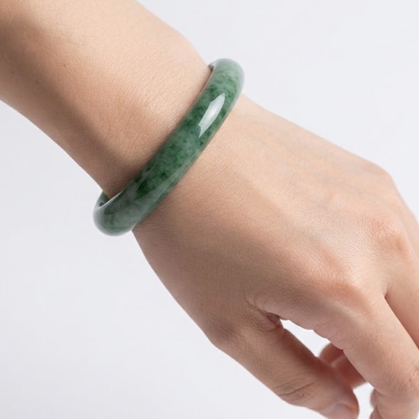 Natural Multi Color Green Jade Gemstones 299.05 Ct. Bangle Round Cabochon Shape 70 x 56 Mm.: Product ID: 819813556 Product Name: Natural Jade Weight: 299.05 CT. Size: 70 x 56 x 15 MM. Shape: Round Color: Green Clarity:Opaque Luster: Good Gems Origin: Thailand Treatment: Unheated Crystal Struc