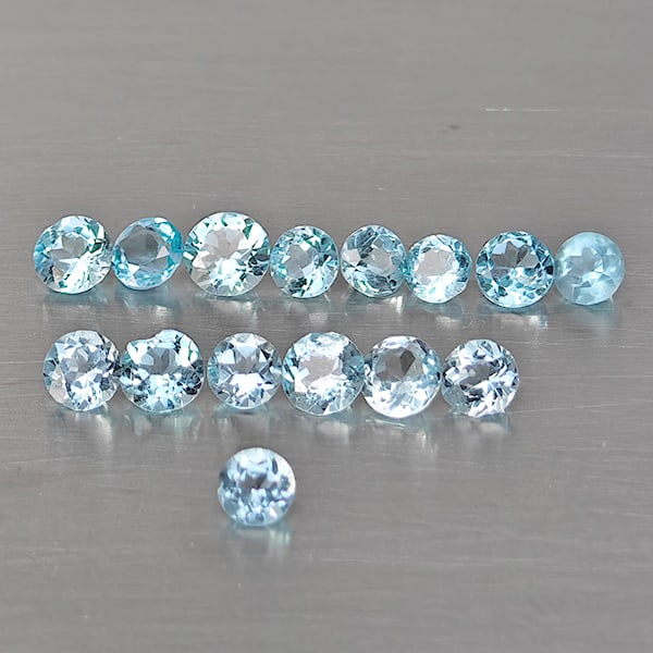 Natural Blue Topaz Gemstones 1.93 Ct. 15 Pcs. Round Shape and Mixed Size: Product ID: 807169121 Product Name: Natural Blue Topaz Weight: 1.93 CT. Size: 3.1 x 3.1 x 2 to 2.5 x 2.5 x 1.8 MM. Shape: Round Shape Color: Blue Clarity:VSI - SI1 Luster: Good Gems Origin: Brazil Tre