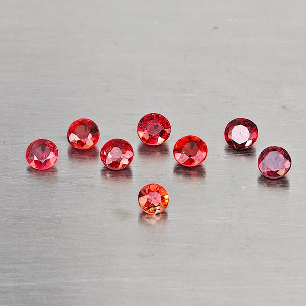 Natural Orangish Red Songea Sapphire Gemstones 1.51 Ct. 8 Pcs. Round Shape 3 Mm.: Product ID: 806130600 Product Name: Natural Red Sapphire Weight: 1.51 CT. Size: 3 x 3 x 2 MM. Shape: Round Shape Color: Orangish Red Clarity:VSI Luster: Good Gems Origin: Tanzania Treatment: Heated Cr