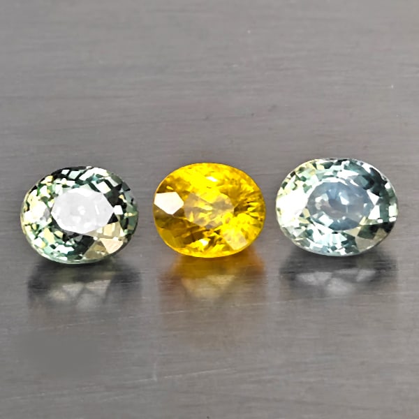 Natural Fancy Color Songea Sapphire Gemstones 1.53 Ct. 3 Pcs. Oval Shape and Mixed Size: Product ID: 806130571 Product Name: Natural Yellow Sapphire Weight: 1.53 CT. Size: 5 x 4.3 x 3.3 to 4.8 x 4.4 x 3.3 MM. Shape: Oval Shape Color: Fancy Color Clarity:VVS - VSI Luster: Good Gems Origin: