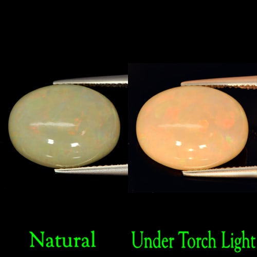 Natural Multi-Color Play Of Colour Opal Gemstones 6.91 Ct. Oval Cabochon Shape 16.1 x 12.2 Mm.: Product ID: 818722553 Product Name: Natural Opal Weight: 6.91 CT. Size: 16.1 x 12.2 x 6.7 MM. Shape: Oval Cabochon Color: Multi Color Clarity:Opaque Luster: Strong Iridescent Gems Origin: Ethiopia Tre