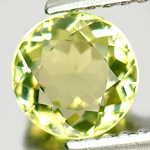 Natural Light Yellow Green Tourmaline Gemstones 0.89 Ct. Round Shape 6 Mm.: Product ID: 807246748 Product Name: Natural Tourmaline Weight: 0.89 CT. Size: 6 x 6 x 3.6 MM. Shape: Round Color: Light Yellow Green Clarity:VSI Luster: Good Gems Origin: Nigeria Treatment: Unheated C