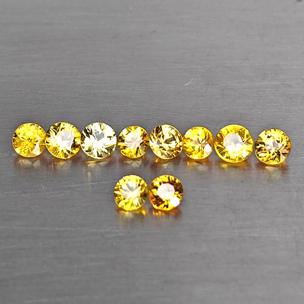 Natural Yellow Songea Sapphire Gemstones 0.72 Ct. 10 Pcs. Round Diamond Cut 2.5 Mm.: Product ID: 806130651 Product Name: Natural Yellow Sapphire Weight: 0.72 CT. Size: 2.5 x 2.5 x 1.8 MM. Shape: Round Diamond Cut Color: Yellow Clarity:VSI Luster: Good Gems Origin: Tanzania Treatment: 