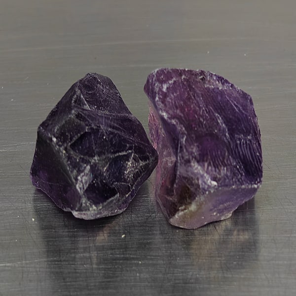 Natural Purple Amethyst Gemstones 45.93 Ct. 2 Pcs. Rough Shape and Mixed Size: Product ID: 800325771 Product Name: Natural Rough Weight: 45.93 CT. Size: 20 x 13.9 to 16.4 x 17 x 13 MM. Shape: Rough Mixed Shape Color: Purple Clarity:None Luster: None Gems Origin: Brazil Treatment