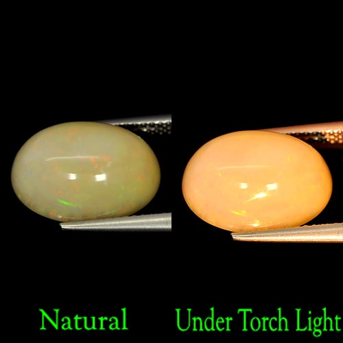 Natural Multi Color Opal Gemstones 6.53 Ct. Oval Cabochon Shape 15.1 x 11.3 Mm.: Product ID: 818708478 Product Name: Natural Opal Weight: 6.53 CT. Size: 15.1 x 11.3 x 7.9 MM. Shape: Oval Cabochon Color: Multi Color Clarity:Semi - Transparent Luster: Good Gems Origin: Ethiopia Trea