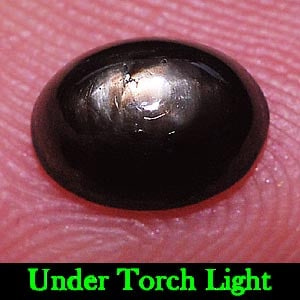 Natural Black Star Sapphire Gemstones 1.83 Ct. Oval Cabochon Shape 7.4 x 5.3 Mm.: Product ID: 806134763 Product Name: Natural Star Sapphire Weight: 1.83 CT. Size: 7.4 x 5.3 x 4.3 MM. Shape: Oval Cabochon Color: Black Clarity:Opaque Luster: Good 6 Rays Star Gems Origin: Thailand Tre