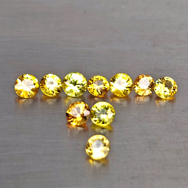 Natural Yellow Songea Sapphire 1.18 Ct. 10 Pcs. Round Shape 2.4 Mm.: Product ID: 806130662 Product Name: Natural Yellow Sapphire Weight: 1.18 CT. Size: 2.4 x 2.4 x 1.5 MM. Shape: Round Shape Color: Yellow Clarity:VSI Luster: Good Gems Origin: Tanzania Treatment: Heated