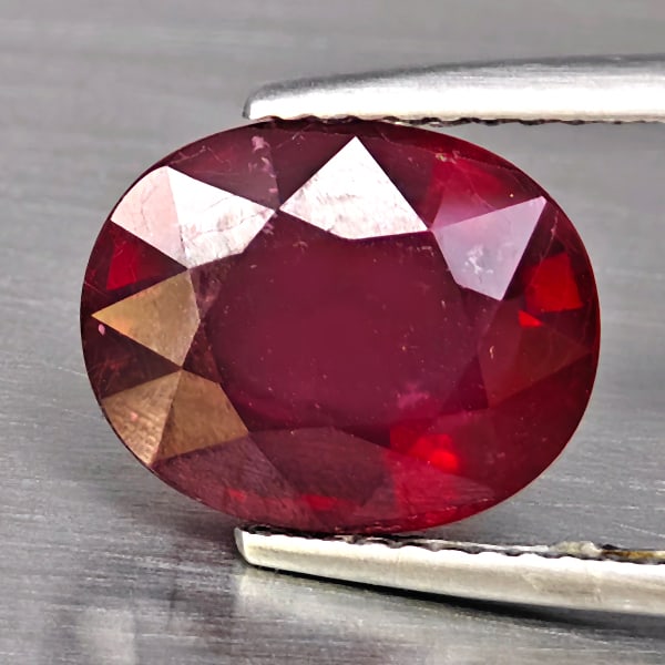 Natural Red Ruby Gemstones 5.94 Ct. Oval Shape 11.2 x 9 Mm.: Product ID: 805936003 Product Name: Natural Ruby Weight: 5.94 CT. Size: 11.2 x 9 x 6.1 MM. Shape: Oval Color: Red Clarity:VSI - SI1 Luster: Good Gems Origin: Madagascar Treatment: Heated (Lead-glass f