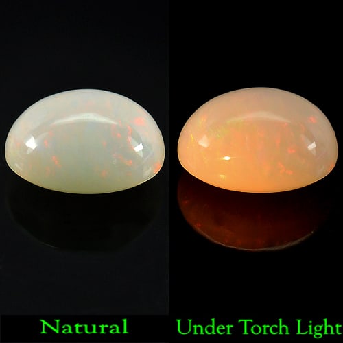 Natural Rainbow Play Of Colour Opal Gemstones 3.72 Ct. Oval Cabochon Shape 12.5 x 9.9 Mm.: Product ID: 818719767 Product Name: Natural Opal Weight: 3.72 CT. Size: 12.5 x 9.9 x 6.7 MM. Shape: Oval Cabochon Color: Rainbow Clarity:Opaque Luster: Stunning Gems Origin: Ethiopia Treatment: Unheat