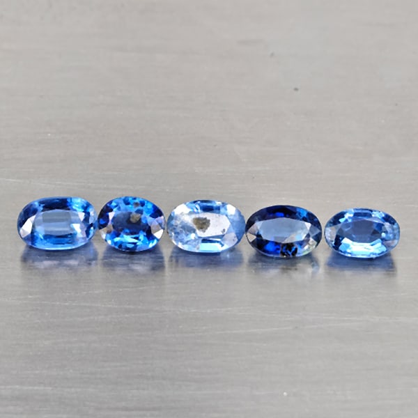 Natural Blue kyanite Gemstones 3.17 Ct. 5 Pcs. Oval Shape and Mixed Size: Product ID: 804204435 Product Name: Natural Kyanite Weight: 3.17 CT. Size: 6.3 x 4.1 x 3.2 to 5.3 x 4.3 x 3.3 MM. Shape: Oval Shape Color: Blue Clarity:VSI - SI1 Luster: Good Gems Origin: Sri - Lanka 