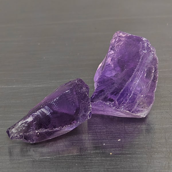 Natural Purple Amethyst Gemstones 23.16 Ct. 2 Pcs. Rough Shape and Mixed Size: Product ID: 800325774 Product Name: Natural Rough Weight: 45.68 CT. Size: 18 x 12.3 x 7.4 to 17 x 15 x 10.3 MM. Shape: Rough Mixed Shape Color: Purple Clarity:None Luster: None Gems Origin: Brazil Tre
