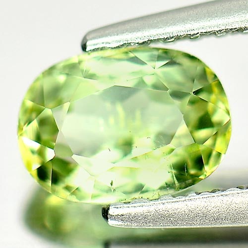 Natural Light Green Tourmaline Gemstones 0.99 Ct. Oval Shape 7 x 5 Mm.: Product ID: 807246097 Product Name: Natural Tourmaline Weight: 0.99 CT. Size: 7 x 5 x 4 MM. Shape: Oval Color: Light Green Clarity:SI1 Luster: Good Gems Origin: Nigeria Treatment: Unheated Crystal Str