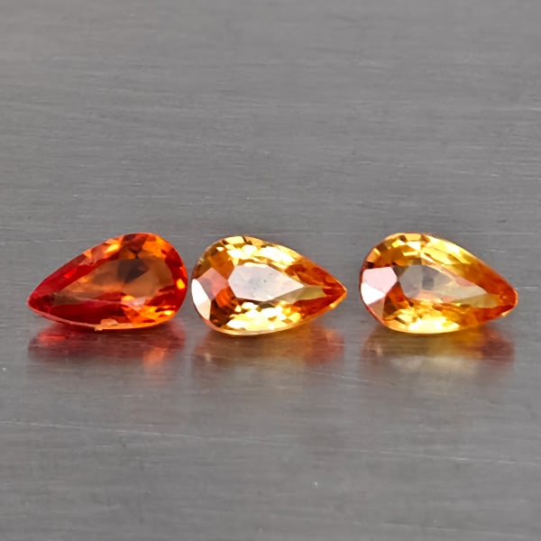 Natural Fancy Color Sapphire Gemstones 0.77 Ct. 3 Pcs. Pear Shape 5 x 3.2 Mm.: Product ID: 806130624 Product Name: Natural Fancy Color Sapphire Weight: 0.77 CT. Size: 5 x 3.2 x 2.3 MM. Shape: Pear Shape Color: Fancy Color Clarity:VSI - SI1 Luster: Good Gems Origin: Tanzania Trea