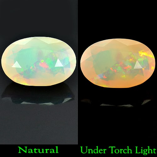 Natural Multi-Color Play Of Colour Opal Gemstones 3.07 Ct. Oval Shape 13.2 x 8.8 Mm.: Product ID: 818708218 Product Name: Natural Opal Weight: 3.07 CT. Size: 13.2 x 8.8 x 5.8 MM. Shape: Oval Color: Multi Color Clarity:Semi - Transparent Luster: Good Gems Origin: Ethiopia Treatment: Unh