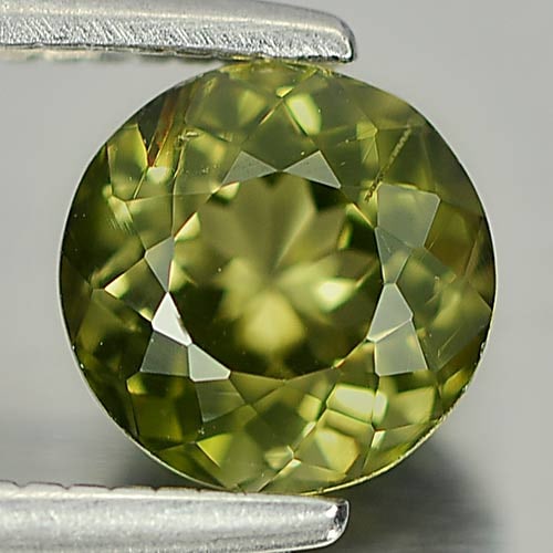 Natural Yellowish Green Tourmaline Gemstones 0.91 Ct. Round Shape 6 Mm.: Product ID: 807246011 Product Name: Natural Tourmaline Weight: 0.91 CT. Size: 6 x 6 x 4.2 MM. Shape: Round Color: Yellowish Green Clarity:VSI Luster: Good Gems Origin: Nigeria Treatment: Unheated Crys