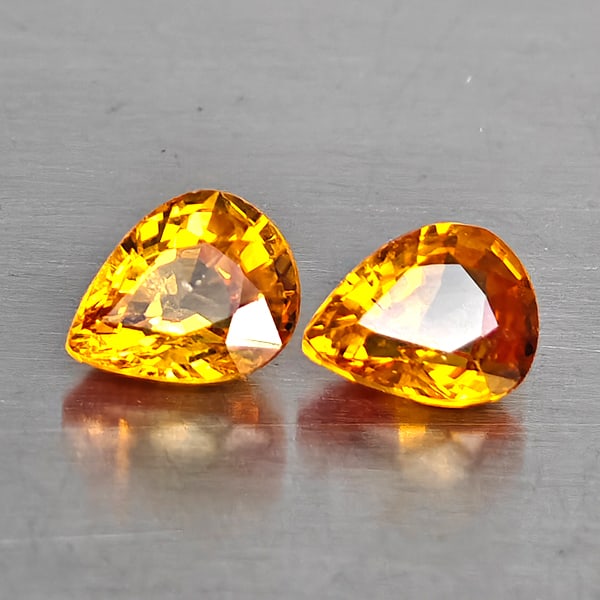 Natural Orangish Red Songea Sapphire Gemstones 1.67 Ct. 2 Pcs. Pear Shape 5.1 x 4.1 Mm.: Product ID: 806130575 Product Name: Natural Yellow Sapphire Weight: 1.67 CT. Size: 5.1 x 4.1 x 2.3 MM. Shape: Pear Color: Orangish Red Clarity:VVS Luster: Good Gems Origin: Tanzania Treatment: Heated 