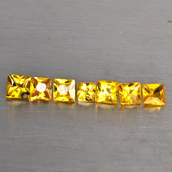 Natural Yellow Songea Sapphire 1.24 Ct. 7 Pcs. Square Shape 2.5 x 2.5 Mm.: Product ID: 806130597 Product Name: Natural Yellow Sapphire Weight: 1.24 CT. Size: 2.5 x 2.5 x 1.6 MM. Shape: Square Color: Yellow Clarity:VSI - SI1 Luster: Good Gems Origin: Tanzania Treatment: Heate