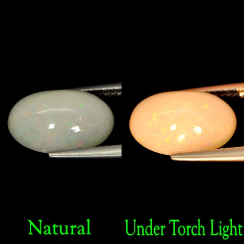 Natural Multi Color Play Of Colour Opal Gemstones 3.68 Ct. Oval Cabochon Shape 14 x 9.8 Mm.: Product ID: 818723847 Product Name: Natural Opal Weight: 3.68 CT. Size: 14 x 9.8 x 6.1 MM. Shape: Oval Cabochon Color: Multi Color Clarity:Semi - Transparent Luster: Strong Iridescent Gems Origin: Eth