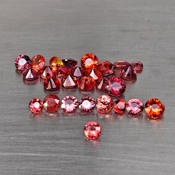 Natural Orangish Red Songea Sapphire Gemstones 3.00 Ct. 29 Pcs. Round Diamond Cut and Mixed Size: Product ID: 806130589 Product Name: Natural Yellow Sapphire Weight: 3.00 CT. Size: 3.2 x 3.2 x 2 to 2.3 x 2.3 x 1.5 MM. Shape: Round Diamond Cut Color: Orangish Red Clarity:VSI - SI Luster: Good Gems 