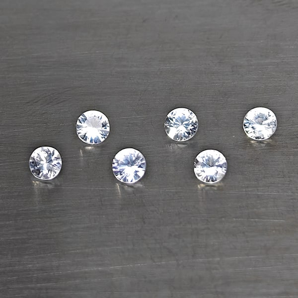 Natural White Sapphire Gemstones 0.77 Ct. 6 Pcs. Round Shape 2.9 Mm.: Product ID: 806130645 Product Name: Natural White Sapphire Weight: 0.77 CT. Size: 2.9 x 2.9 x 1.8 MM. Shape: Round Shape Color: White Clarity:VSI Luster: Good Gems Origin: Sri - Lanka Treatment: Heate
