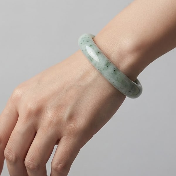 Natural Green White Jade Gemstones 346.68 Ct. Bangle Round Cabochon Shape 72 x 57 Mm.: Product ID: 819813561 Product Name: Natural Jade Weight: 346.68 CT. Size: 72 x 57 x 15 MM. Shape: Round Color: Green Clarity:Opaque Luster: Good Gems Origin: Thailand Treatment: Unheated Crystal Struc