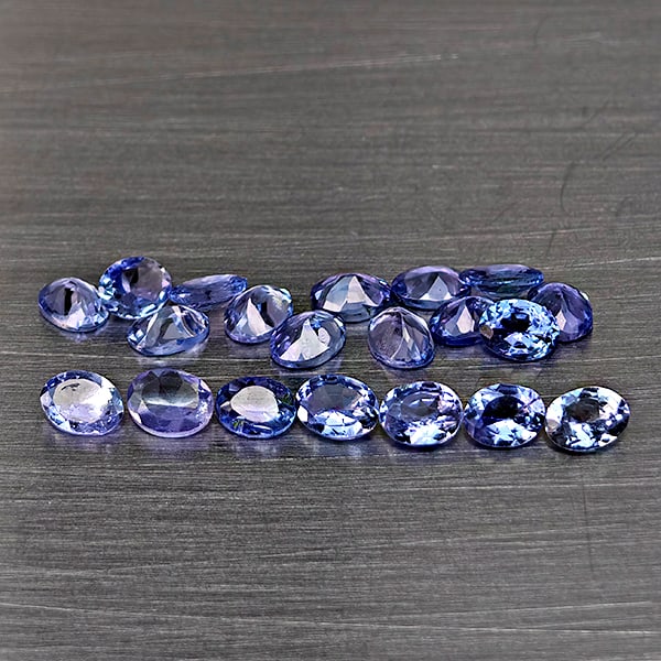 Natural Violetish Blue Tanzanite Gemstones 3.50 Ct. 20 Pcs. Oval Shape 4 x 3 Mm.: Product ID: 807015123 Product Name: Natural Tanzanite Weight: 3.50 CT. Size: 4 x 3 x 2.1 MM. Shape: Oval Color: Violetish Blue Clarity:VSI Luster: Good Gems Origin: Tanzania Treatment: Heated Crystal 