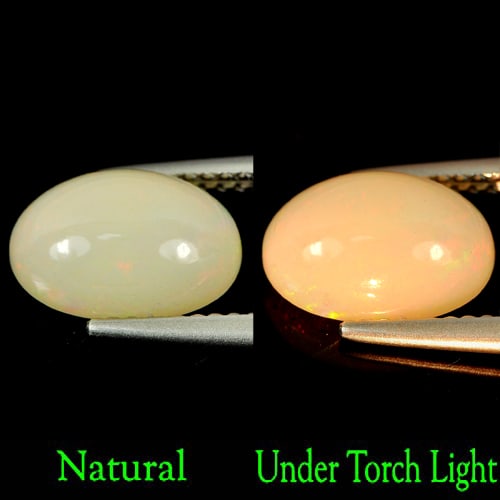 Natural Multi-Color Opal Gemstones 1.71 Ct. Oval Cabochon Shape 10.7 x 7.5 Mm.: Product ID: 818722609 Product Name: Natural Opal Weight: 1.71 CT. Size: 10.7 x 7.5 x 5.1 MM. Shape: Oval Cabochon Color: Multi Color Clarity:Semi - Transparent Luster: Strong Iridescent Gems Origin: E