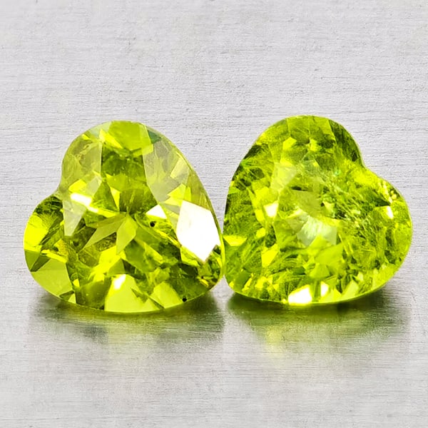 Natural Green Peridot Gemstones 1.86 Ct. 2 Pcs. Heart Shape 6 x 6 Mm.: Product ID: 805317304 Product Name: Natural Peridot Weight: 1.86 CT. Size: 6 x 6 x 4.1 MM. Shape: Heart Shape Color: Green Clarity:VSI - SI1 Luster: Good Gems Origin: Pakistan Treatment: Unheated Crys