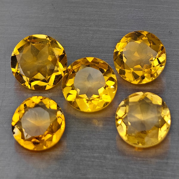 Natural Yellow Citrine Gemstones 5.19 Ct. 5 Pcs. Round Shape 7 Mm.: Product ID: 801815523 Product Name: Natural Citrine Weight: 5.19 CT. Size: 7 x 7 x 4 MM. Shape: Round Shape Color: Yellow Clarity: VVS Luster: Good Gems Origin: Brazil Treatment: Unheated Crystal Stru
