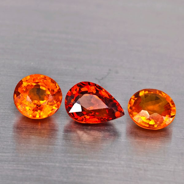 Natural Orangish Red Spessartine Garnet Gemstones 3.11 Ct. 3 Pcs. Mixed Shape: Product ID: 802937925 Product Name: Natural Garnet Weight: 3.11 CT. Size: 7.5 x 5.3 x 4 to 6 x 6 x 2.9 MM. Shape: Mixed Shape Color: Orangish Red Clarity:SI1 Luster: Good Gems Origin: Namibia Treatmen