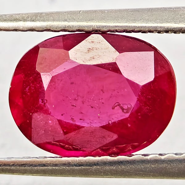 Natural Purplish Red Ruby Gemstones 2.54 Ct. Oval Shape 9 x 6.8 Mm.: Product ID: 805935672 Product Name: Natural Ruby Weight: 2.54 CT. Size: 9 x 6.8 x 4 MM. Shape: Oval Color: Purplish Red Clarity:VSI Luster: Good Gems Origin: Madagascar Treatment: Heated (Lead-glass f